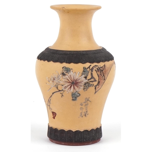 430 - A Chinese Yixing pottery vase, Republic period, decorated with a chrysanthemum, signed, 25cm high.