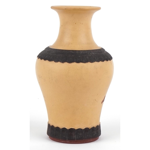 430 - A Chinese Yixing pottery vase, Republic period, decorated with a chrysanthemum, signed, 25cm high.