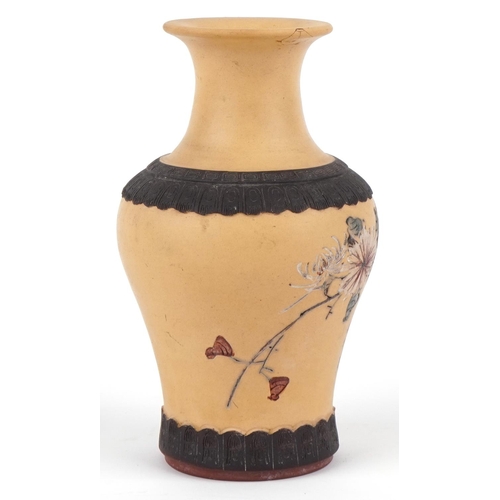 430 - A Chinese Yixing pottery vase, Republic period, decorated with a chrysanthemum, signed, 25cm high.