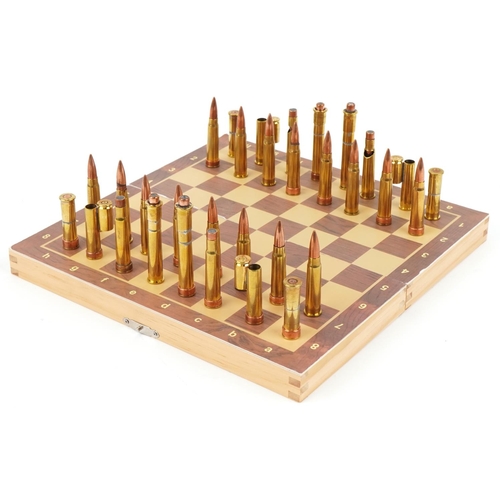 1491 - A military interest copper and brass ammunition shell case chess set with magnetic bases and The Pre... 