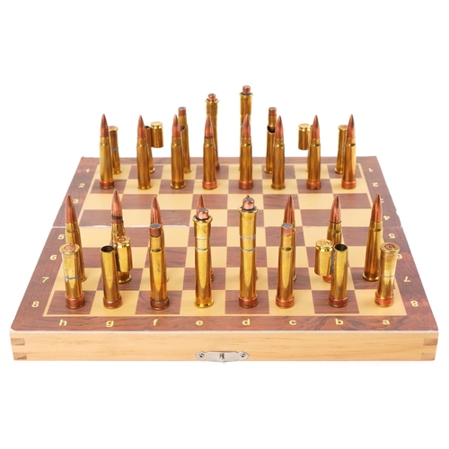 1491 - A military interest copper and brass ammunition shell case chess set with magnetic bases and The Pre... 