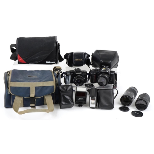 1187 - Two cameras and lenses comprising a Minolta 7000 together with a Minolta AF 70-210 lens and Nikon F-... 