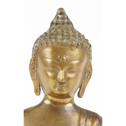 40 - A Sino-Tibetan gilt bronze figure of Shakyamuni Buddha, 37cm high.