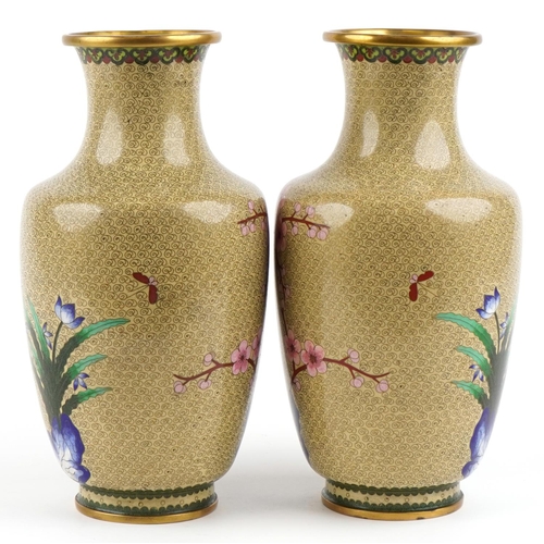 39 - A pair of Chinese cloisonné vases, 20th century, each with floral decoration, 39cm high.