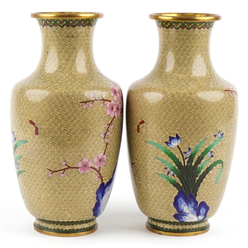 39 - A pair of Chinese cloisonné vases, 20th century, each with floral decoration, 39cm high.