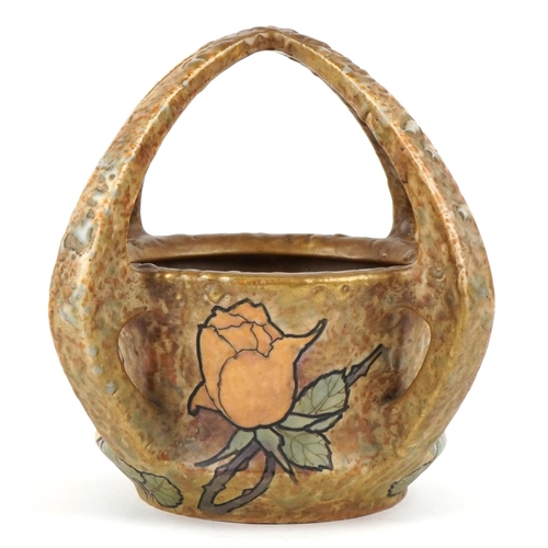 217 - An Art Nouveau Bohemia Amphora pottery vase circa 1900, decorated with roses, with four stylized han... 