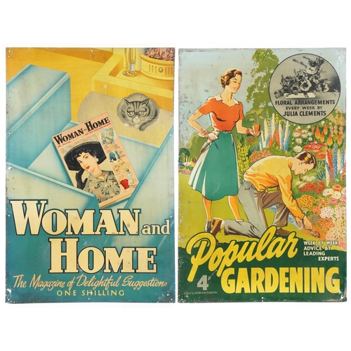 Two advertising tin posters for Popular Gardening and Woman & Home, each 76cm x 49cm.