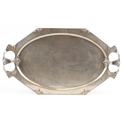 166 - An Art Nouveau Secessionist silver plated brass tray with stylized handles, 61cm wide.