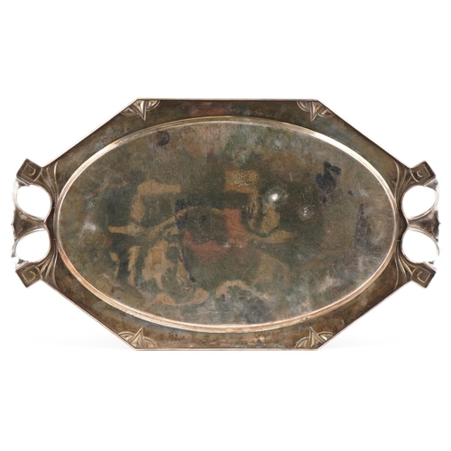 166 - An Art Nouveau Secessionist silver plated brass tray with stylized handles, 61cm wide.