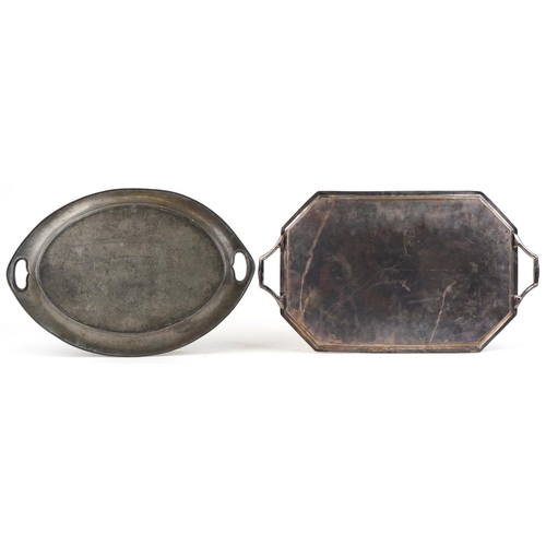 497 - Two Arts & Crafts twin handled trays including a planished pewter example, the largest 61cm wide.