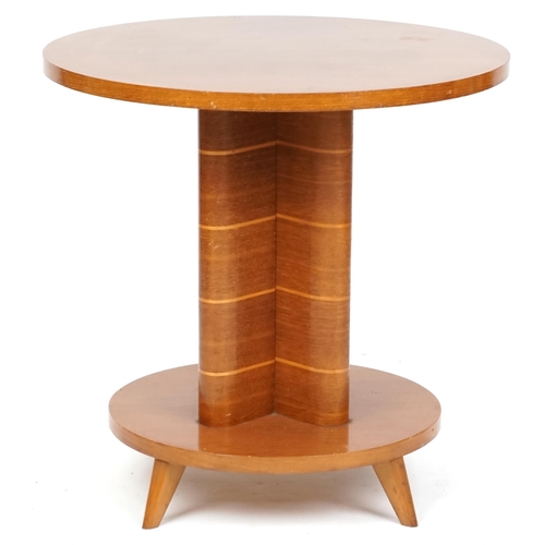 2109 - An Art Deco oak circular wine table, the quatrefoil support on a circular plinth with four out swept... 