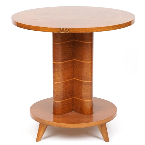 2109 - An Art Deco oak circular wine table, the quatrefoil support on a circular plinth with four out swept... 