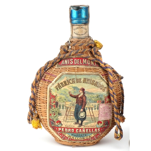 2556 - A Pedro Cañellas Fábrica de Anisados empty bottle, 20cm high together with an early 20th century Sov... 