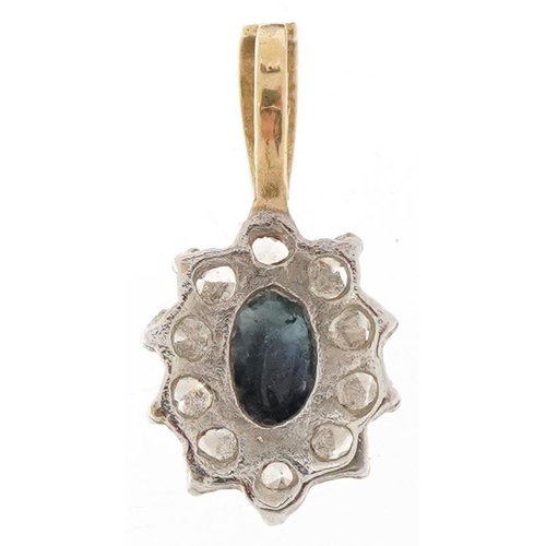 3556 - A 9ct gold sapphire and clear stone cluster pendant, 1.5cm high, 0.5g.