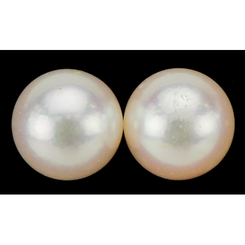 A pair of 9ct gold cultured pearl stud earrings, 9.0mm in diameter ...