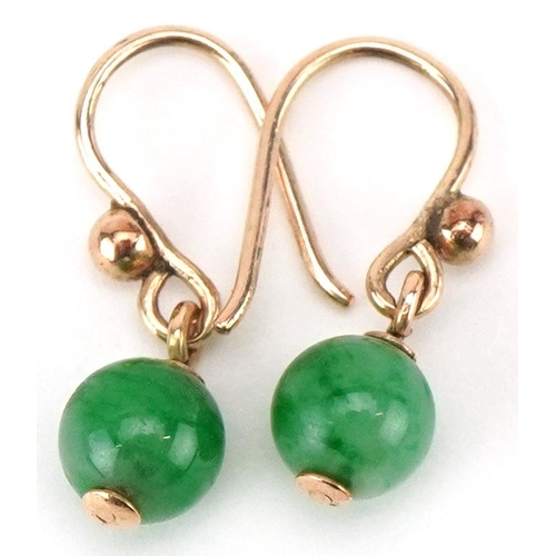 A pair of unmarked gold green jade bead earrings, 1.9cm high, total 1.3g.