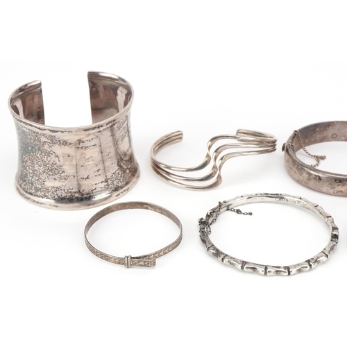 3714 - A collection of antique and later silver bracelets and bangles including a large cuff bracelet, tota... 