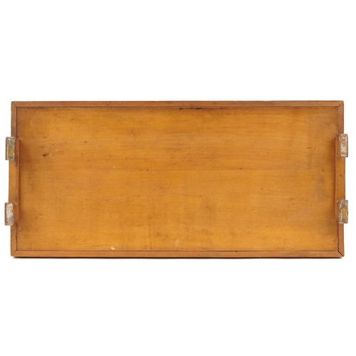 400 - An Edwardian Arts & Crafts satinwood rectangular tray with penwork decoration having two pierced han... 