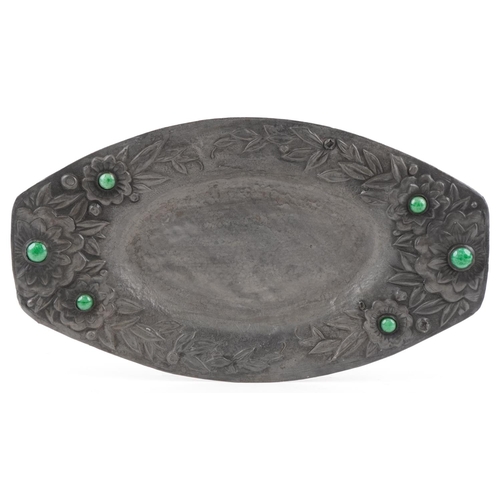 159 - An early 20th century Arts & Crafts pewter shallow dish with inset green hardstone cabochons and flo... 