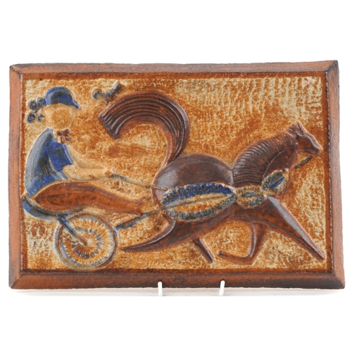 426 - A mid 20th century Danish Søholm ceramic relief moulded wall plaque of a jockey and horse by Joseph ... 