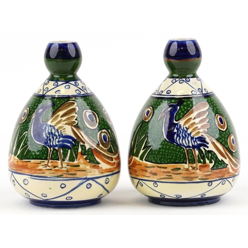 421 - A pair of 20th century, possibly Mexican, pottery vases, each with polychrome hand painted decoratio... 