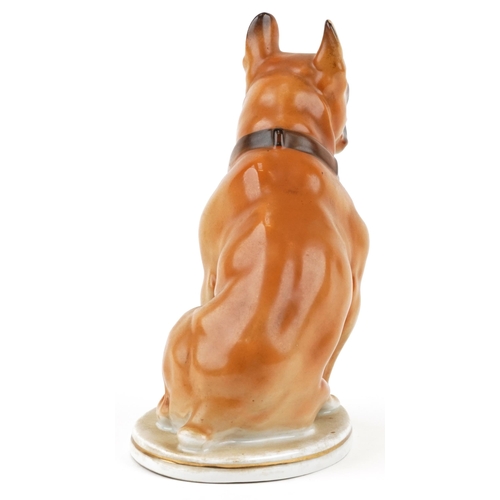 417 - A Russian USSR porcelain study of a seated dog, 25cm high.