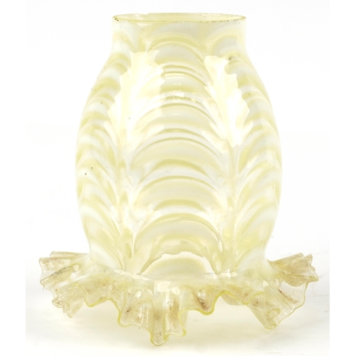 258 - A Victorian Vaseline and uranium glass frilled lampshade, 15.5cm high, the fitting 6.5cm in diameter... 