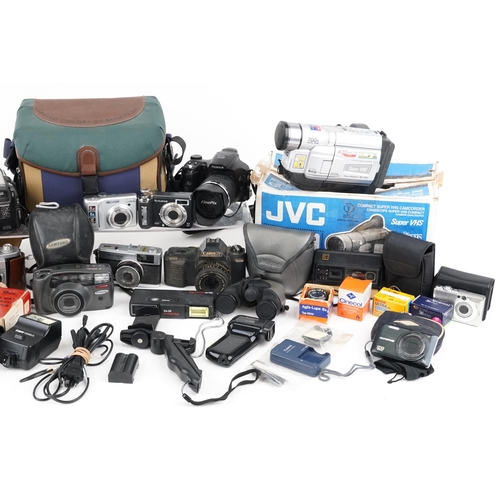 1189 - Vintage and later cameras, digital cameras, video recorders accessories and binoculars including Can... 