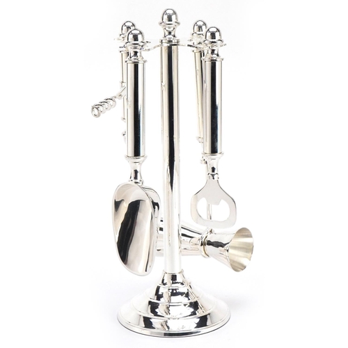 2562 - A silver plated bar compendium set, 27cm high.