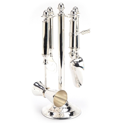 2562 - A silver plated bar compendium set, 27cm high.