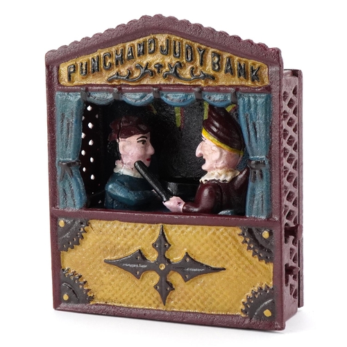 1164 - A novelty cast iron Punch & Judy money bank, 18cm high.