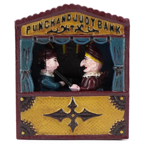 1164 - A novelty cast iron Punch & Judy money bank, 18cm high.