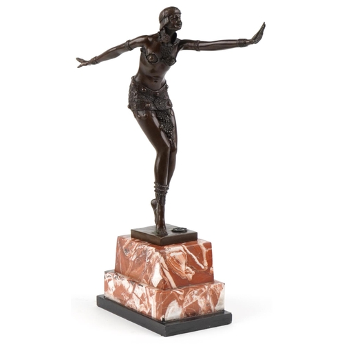 485 - After Chiparus, a patinated bronze study of an Art Deco female dancer raised on a stepped marble and... 