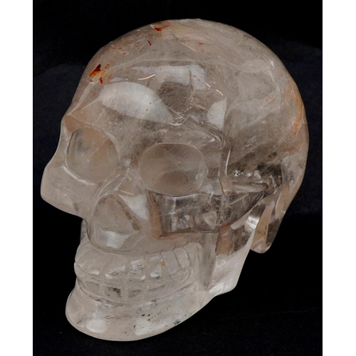 2551 - A polished rock crystal study of a human skull, 16cm in length.