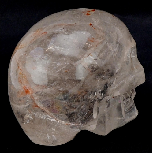 2551 - A polished rock crystal study of a human skull, 16cm in length.