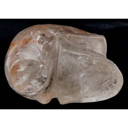 2551 - A polished rock crystal study of a human skull, 16cm in length.