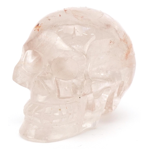 2551 - A polished rock crystal study of a human skull, 16cm in length.