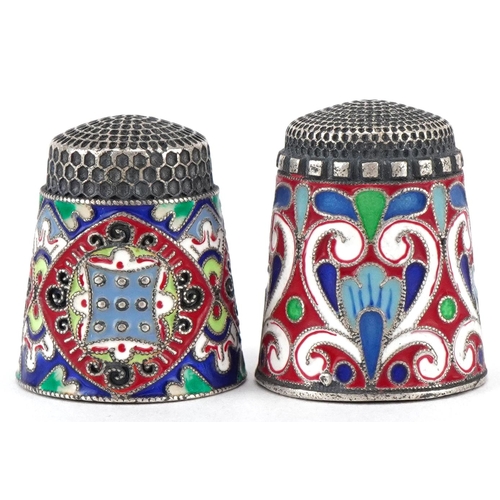 596 - Two silver and champlevé enamel thimbles, impressed Russian marks, the largest 2.3cm high, total 22.... 