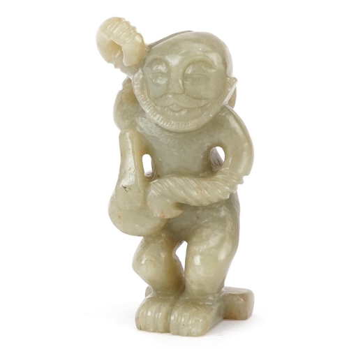 389 - A carved hardstone study of a mythical figure, 8cm high.