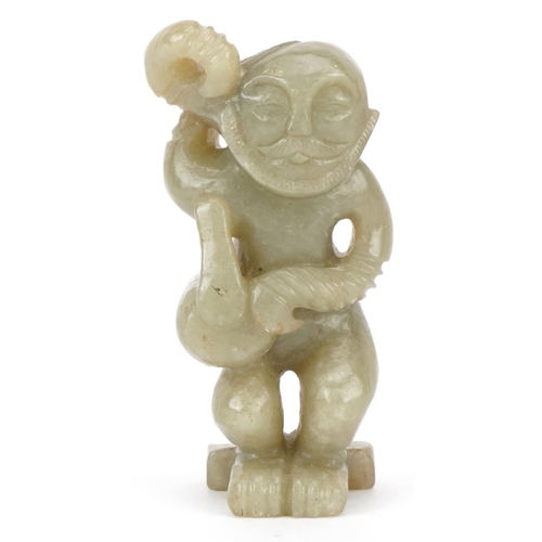 389 - A carved hardstone study of a mythical figure, 8cm high.