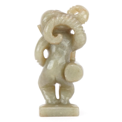 389 - A carved hardstone study of a mythical figure, 8cm high.