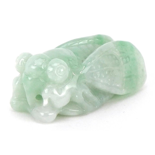 A Chinese carved green jade netsuke in the form of a winged insect, 3 ...