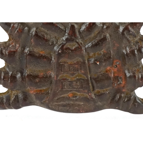 1623 - A Japanese patinated bronze study of a crab, character marks to the base, 11.5cm wide.