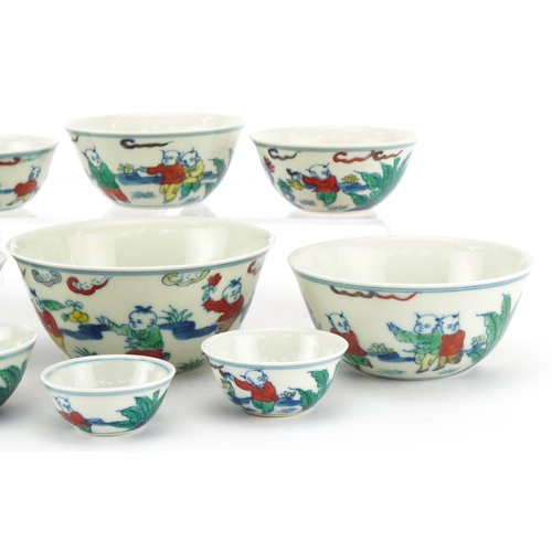 37 - A set of nine Chinese graduated porcelain bowls, 20th century, each with hand painted decoration, be... 