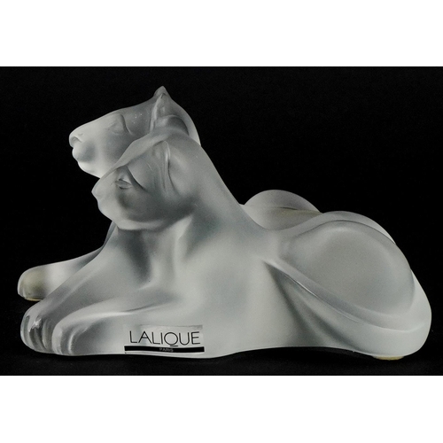 173 - Lalique, a frosted glass study of two lion cubs, etched Lalique France to the base, 12.5cm in length... 