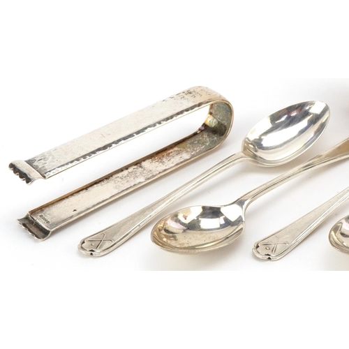 599 - Edwardian and later silver including a set of four golfing interest teaspoons by Walker & Hall, a sh... 