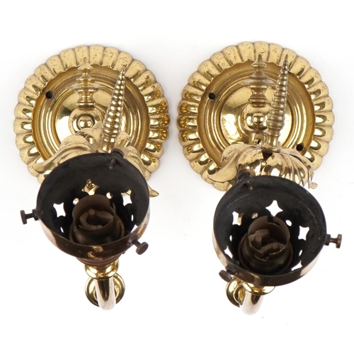 357 - A pair of Gothic Revival brass wall lights, 33cm in length.