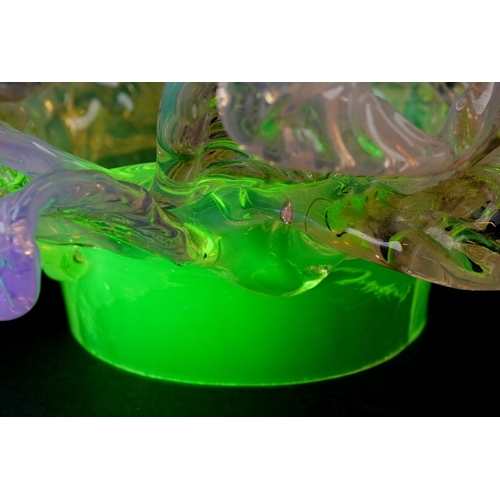 259 - A pair of Vaseline and uranium glass floral light shades, approximately 15cm in diameter, the fittin... 