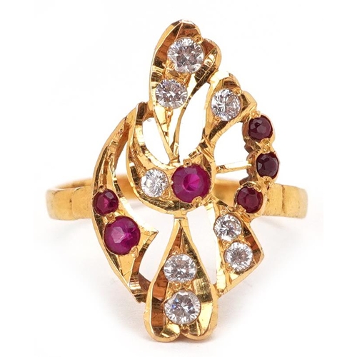 3059 - A 22ct gold ruby and clear stone cocktail ring marked 916, size M, 3.6g.