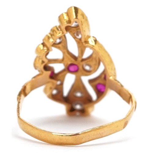 3059 - A 22ct gold ruby and clear stone cocktail ring marked 916, size M, 3.6g.